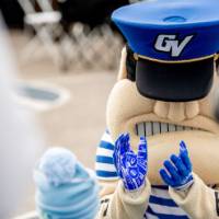 Louie claps with a little Laker